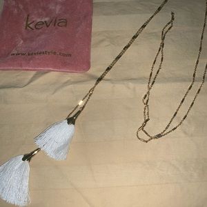 Kevia tassel necklace with pink  bag